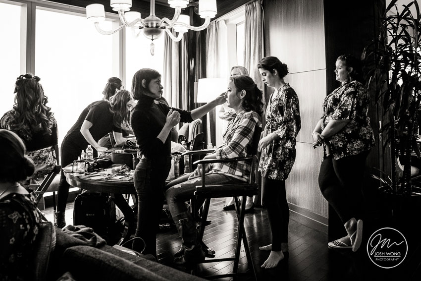 The bridesmaids all getting ready with hair and makeup by MetroLook NYC. A Mandarin Oriental NYV Hotel Wedding by New York Wedding Photographer - Josh Wong Photography.