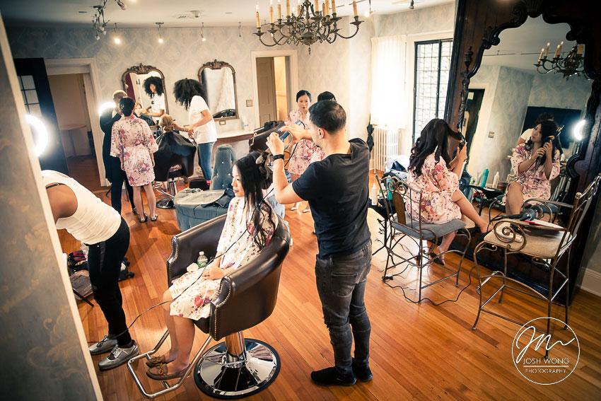 The bride and her bridesmaids all get ready in the bridal suite. A Gorgeous wedding at Pleasantdale Chateau in New Jersey by top NJ wedding photographer Josh Wong Photography