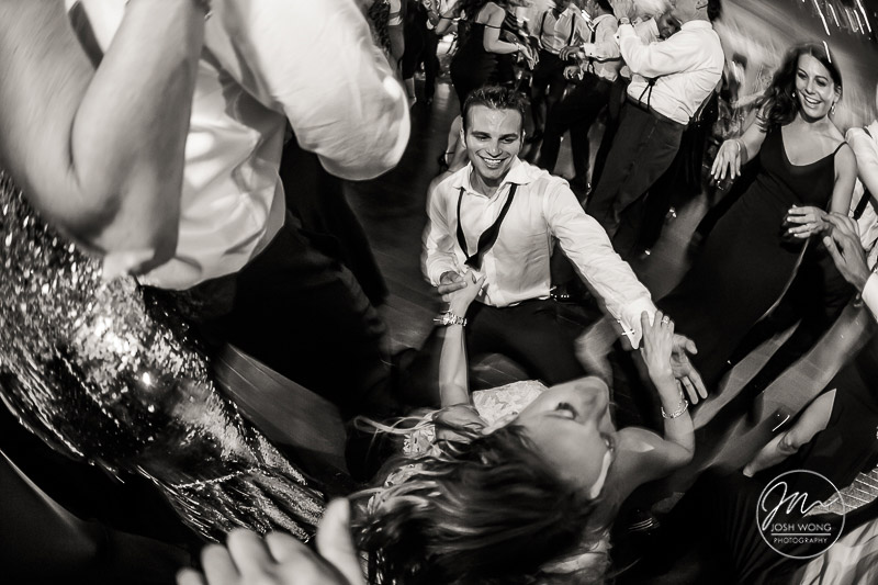 The dance floor was rocking. by award-winning wedding photographer Josh Wong Photography