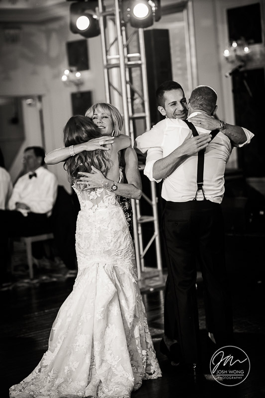 Best emotional moments at a wedding happen during the speeches. A Temple of Israel Wedding in Lawrence NY by top wedding photographer Josh Wong Photography.