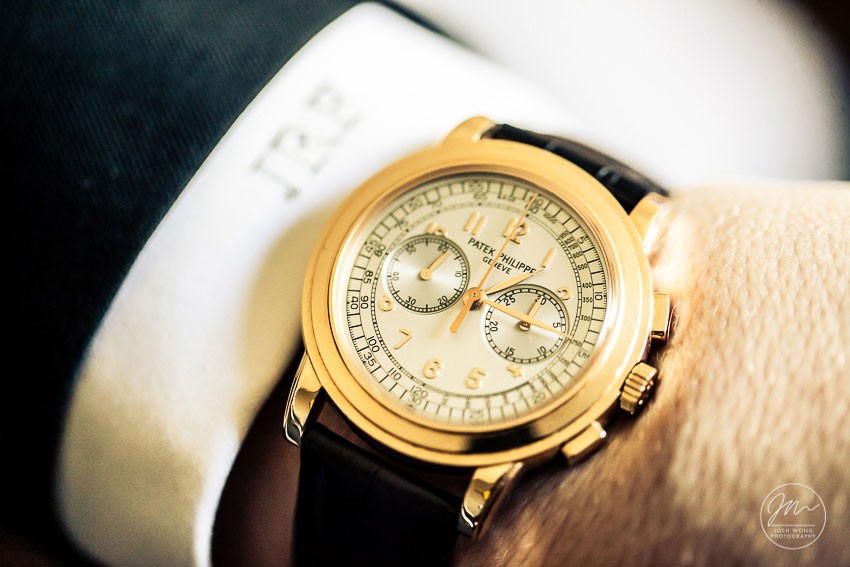 A luxurious Patek Philippe watch for the groom. wedding photo by Josh Wong Photography