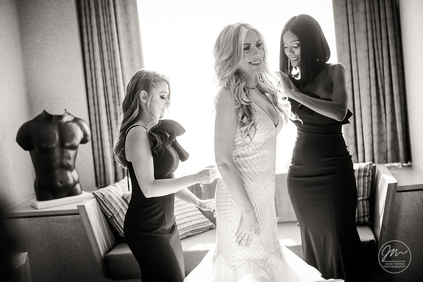 Best candid wedding moments are when the bridal party are getting ready. The Parker Hotel New York City Wedding photos by Top NYC Wedding Photographer Josh Wong