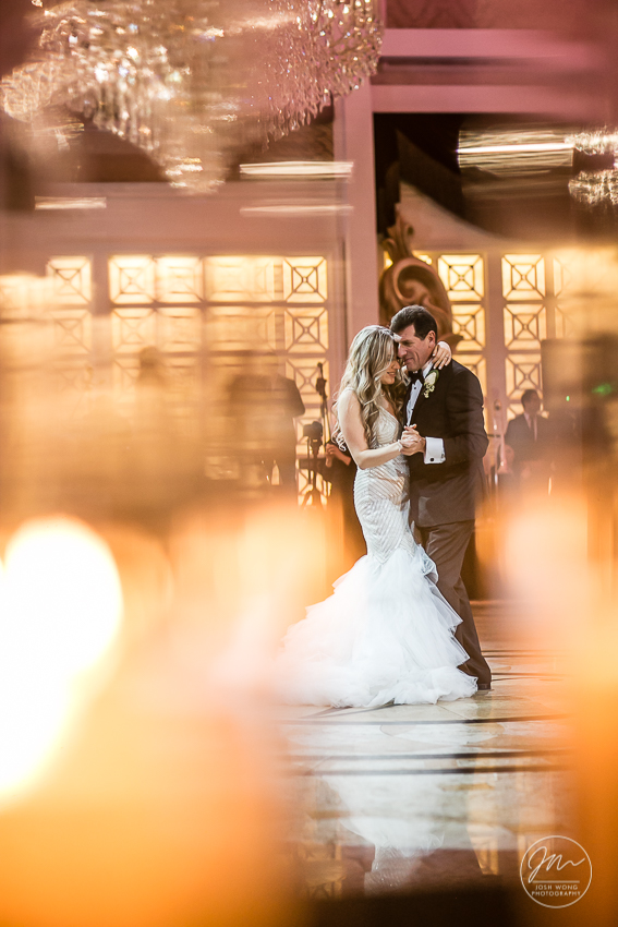 An emotional father daughter dance.   Best wedding candid moments at The Venetian in Garfield, NJ. Wedding photos by Josh Wong Photography