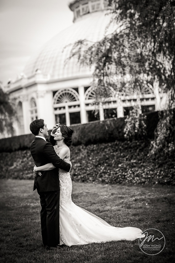 The groom gets a glimpse of the bride for the first time. New York Botanical Garden Wedding Pictures by NYC Wedding Photographer Josh Wong Photography