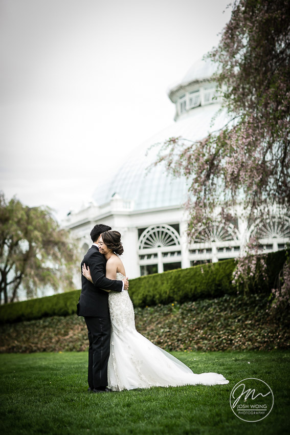 The groom gets a glimpse of the bride for the first time. New York Botanical Garden Wedding Pictures by NYC Wedding Photographer Josh Wong Photography
