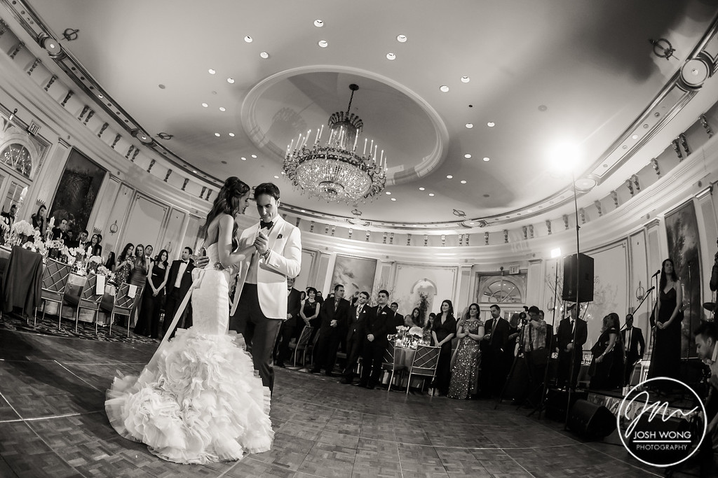 The first dance in the ballroom of the Lotte New York Palace Hotel. Wedding photos by Josh Wong Photography
