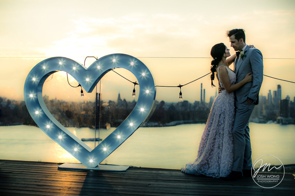 The sunset view from the rooftop terrace. A William Vale wedding in Brooklyn NY by top wedding photographer Josh Wong Photography
