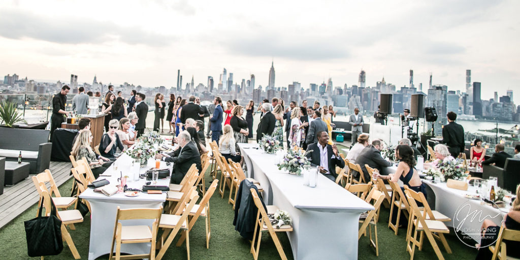 The sunset view from the rooftop terrace. A William Vale wedding in Brooklyn NY by top wedding photographer Josh Wong Photography