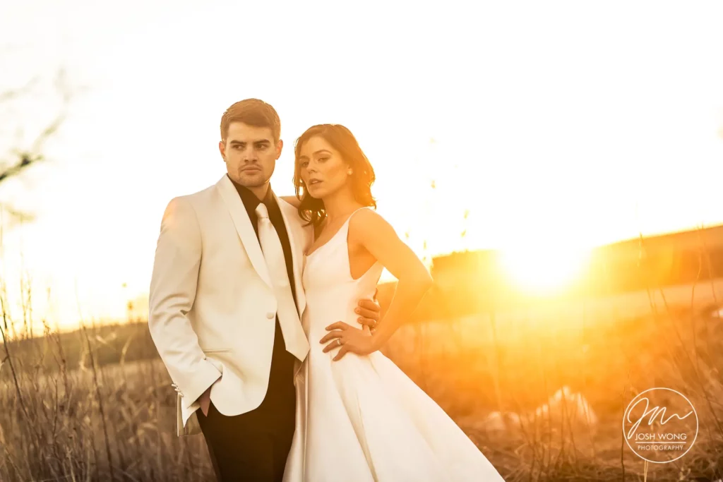 A sunset photoshoot with the bride and groom by top Lincoln,NE fashion photographer Josh Wong Photography
