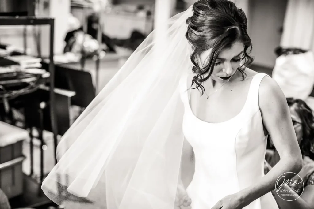 Best Candid Wedding moments. Getting Ready wedding photos. Cool Lincoln Nebraska winter wedding photos by top NE wedding photographer Josh Wong Photography