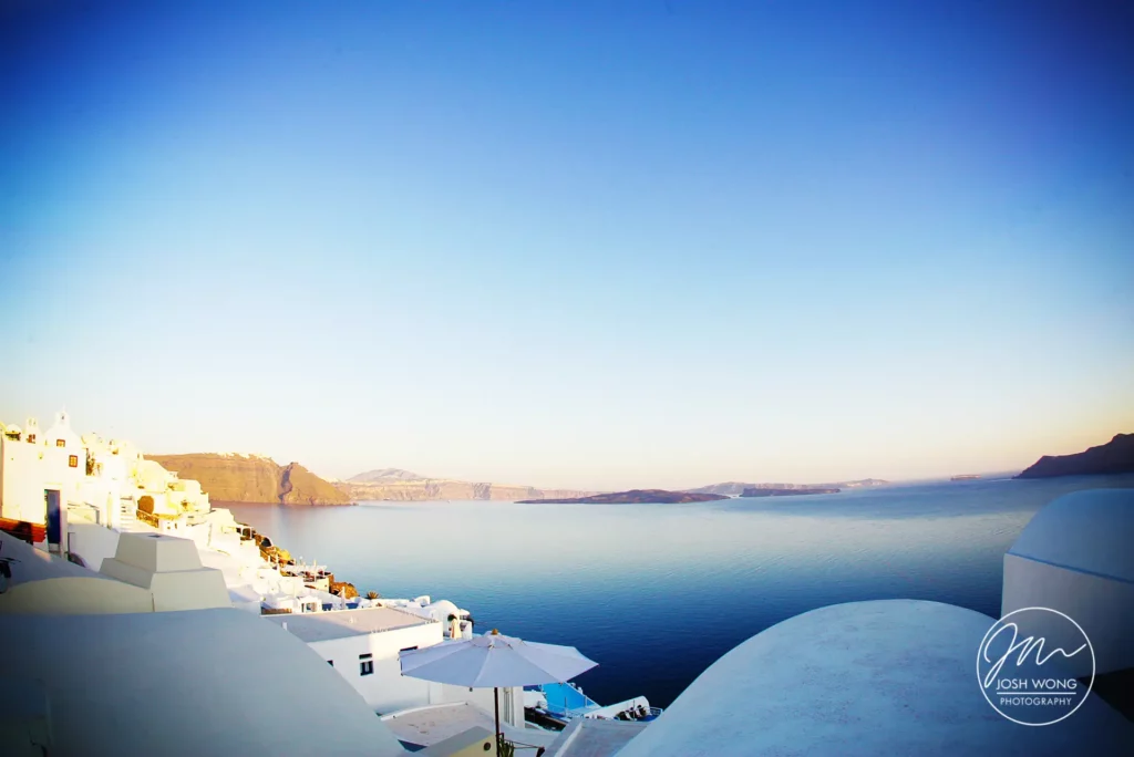 The signature blue and white color tones of Santorini Greece. A Greece Santorini destination wedding by top international wedding photographer Josh Wong Photography