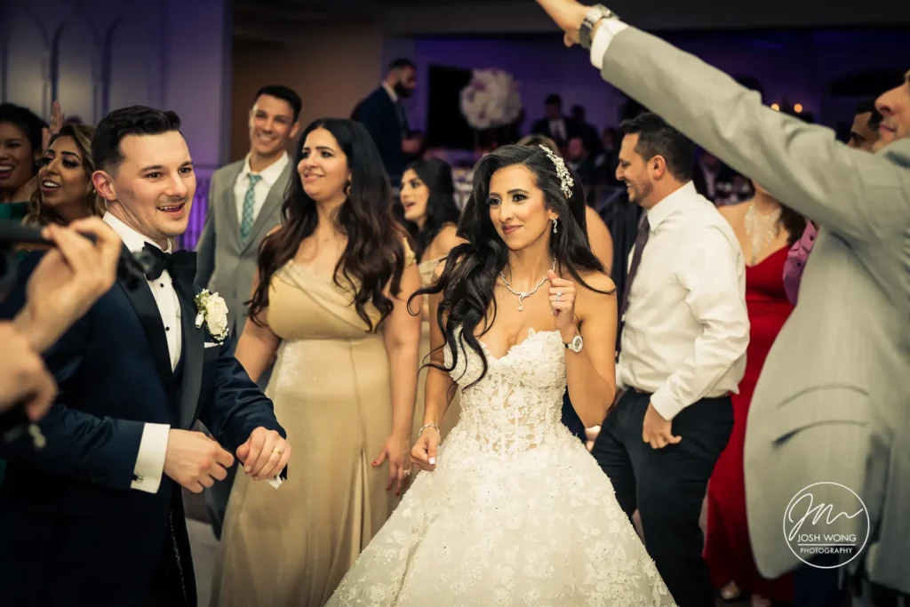 Candid wedding moments photographed by New Jersey's top wedding photographer Josh Wong.