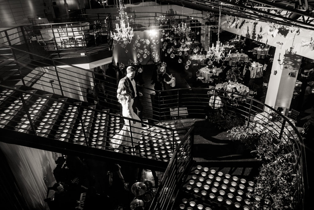 The bride and groom make their grand entrance. A Tribeca Rooftop wedding by Josh Wong Photography