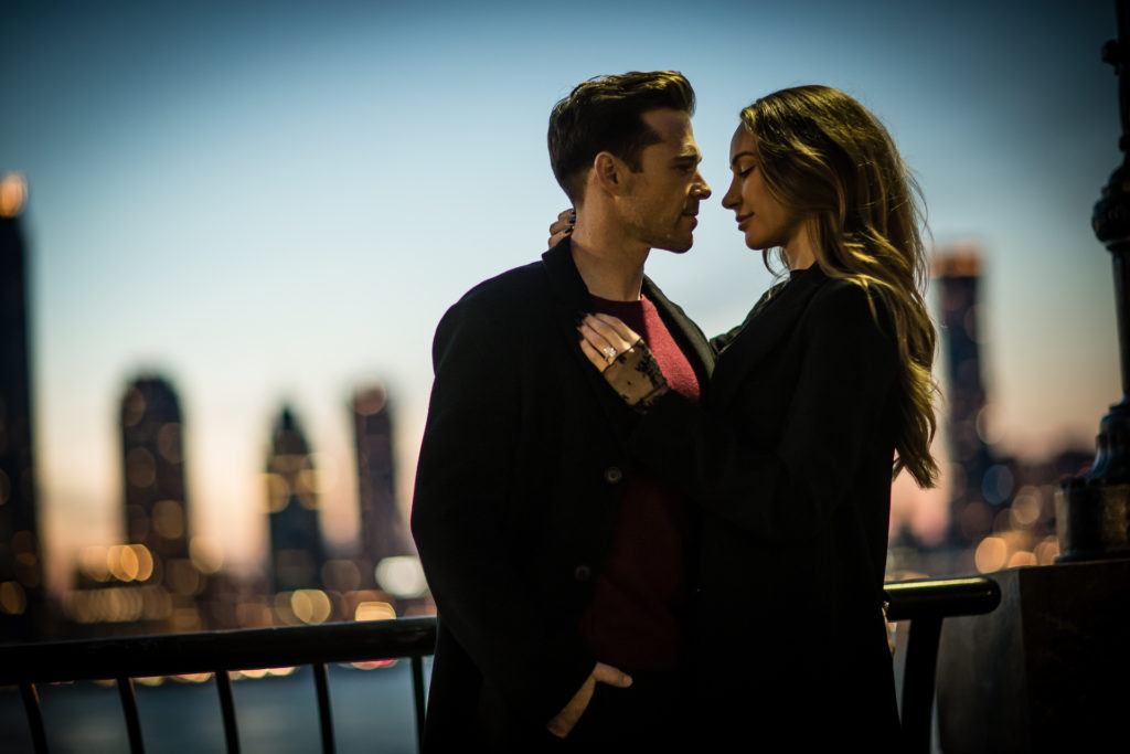 A romantic marriage proposal in Battery Park's Lily Pond. wedding proposal inspiration. Engagement photography by NYC wedding photographer Josh Wong Photography