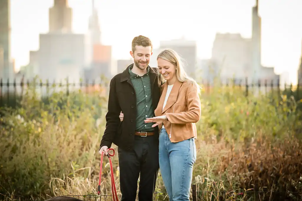 The beautiful reactions of a fall sunset engagement proposal in the Upper West Side in Central Park. 